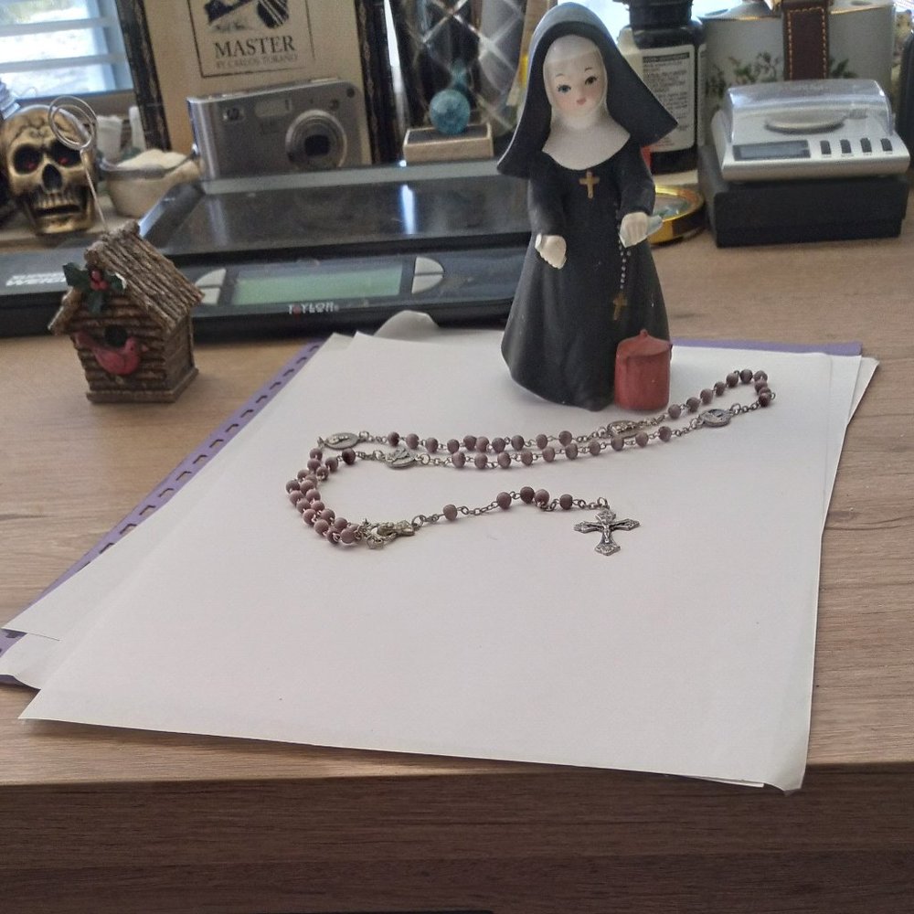 The catholic nun and italian made rosery